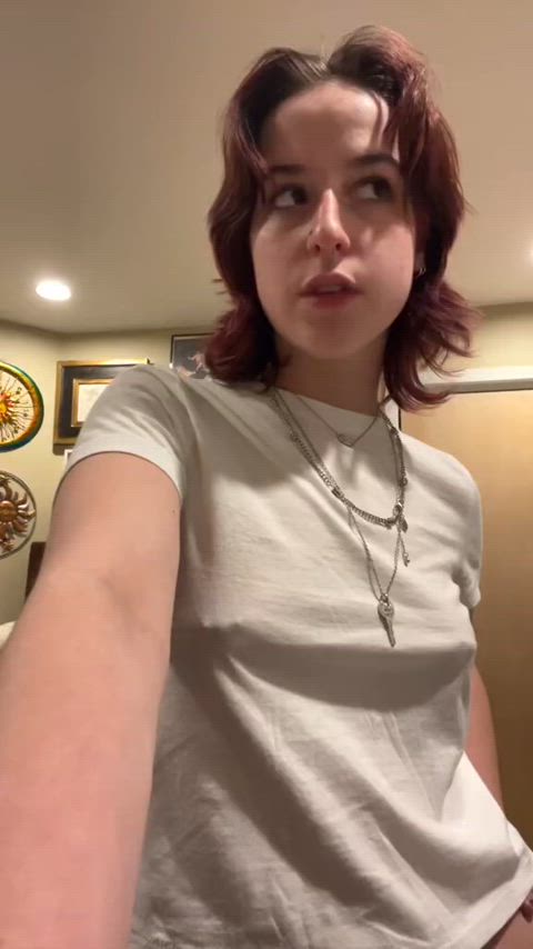 Showing off in a white tee