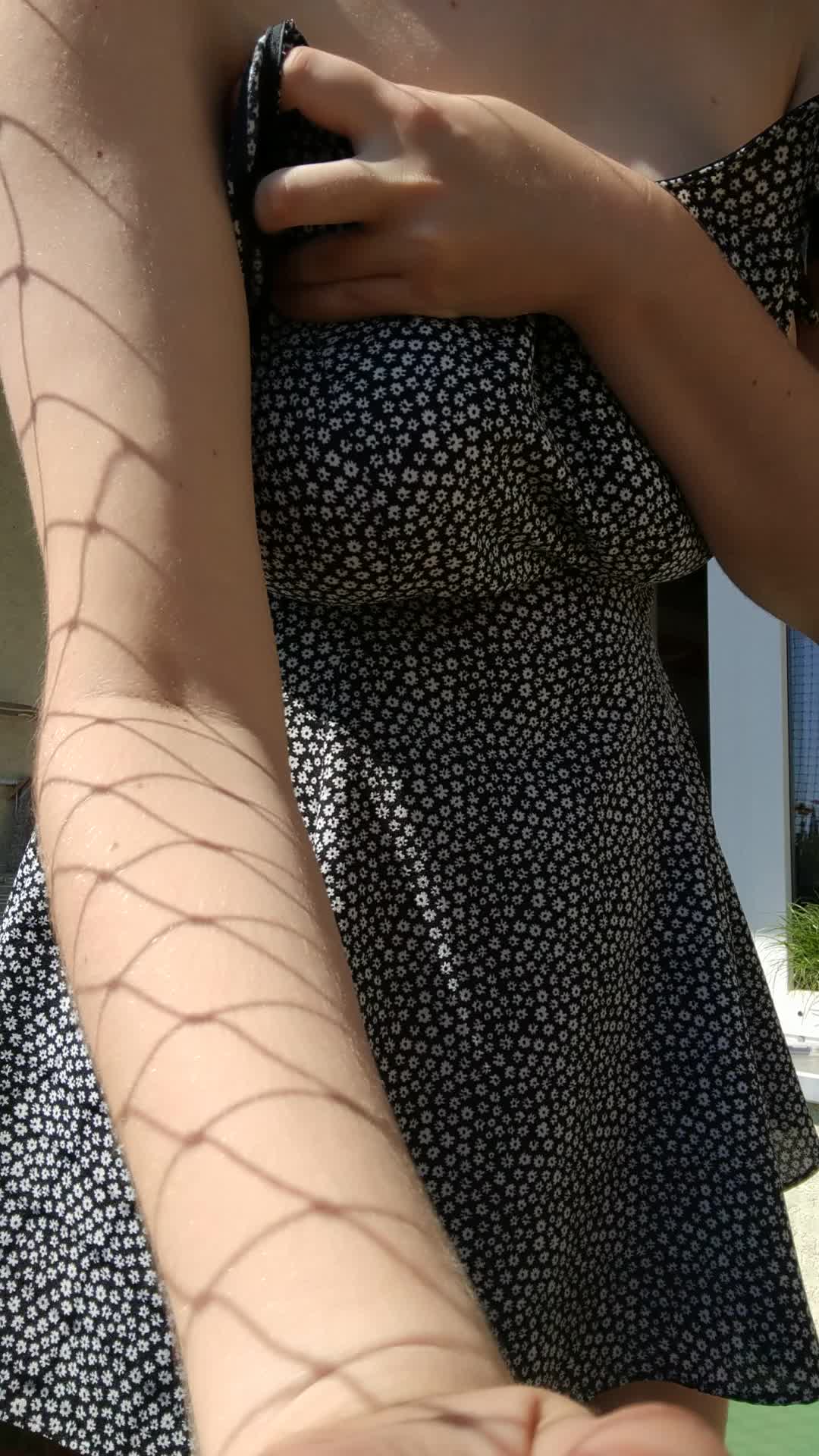 Sundress reveal on the balcony
