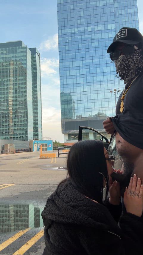 Bent over in the parking lot