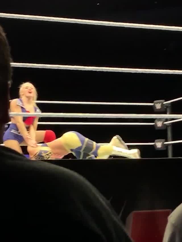 Lacey spanks Bayley's ass