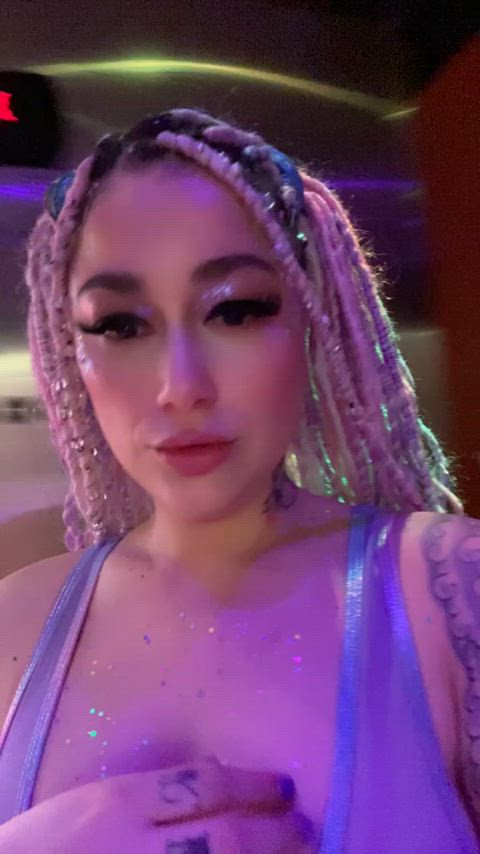 Just a slut pulling out her tits at the club