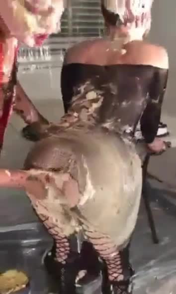 Pornstar Olivia Wilder covered in dessert, playing with her partner