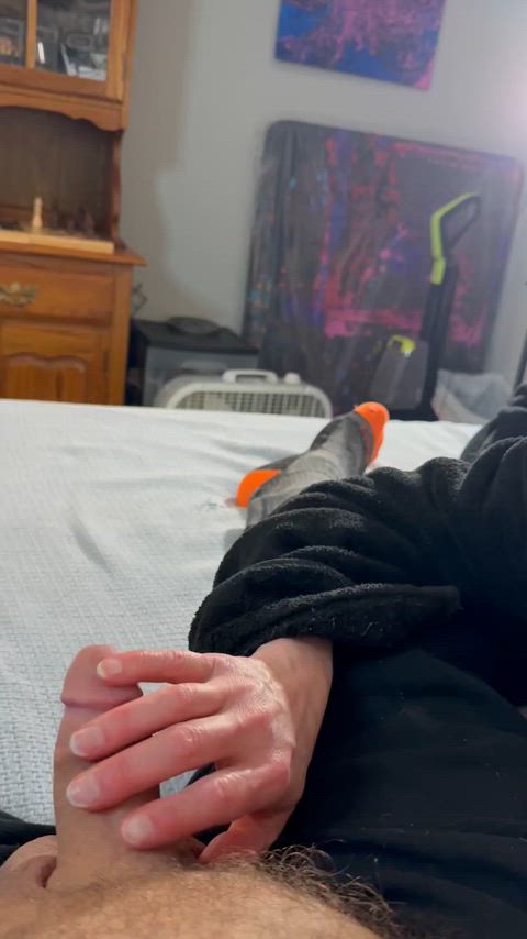 Just casually playing with it keeping him hard while I play on my phone