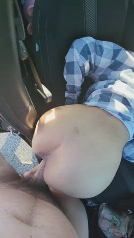 hitting it in the car by the road side