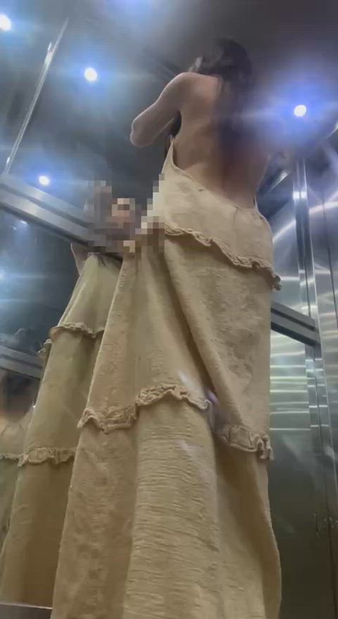 My dress fell into my elevator, it wasn't totally planned