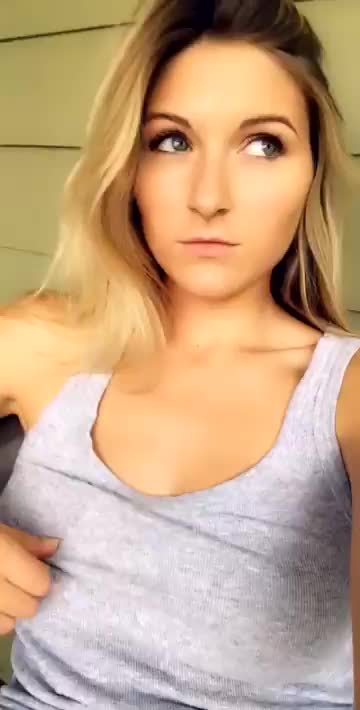 Showing Boobies On A Porch In The Suburbs