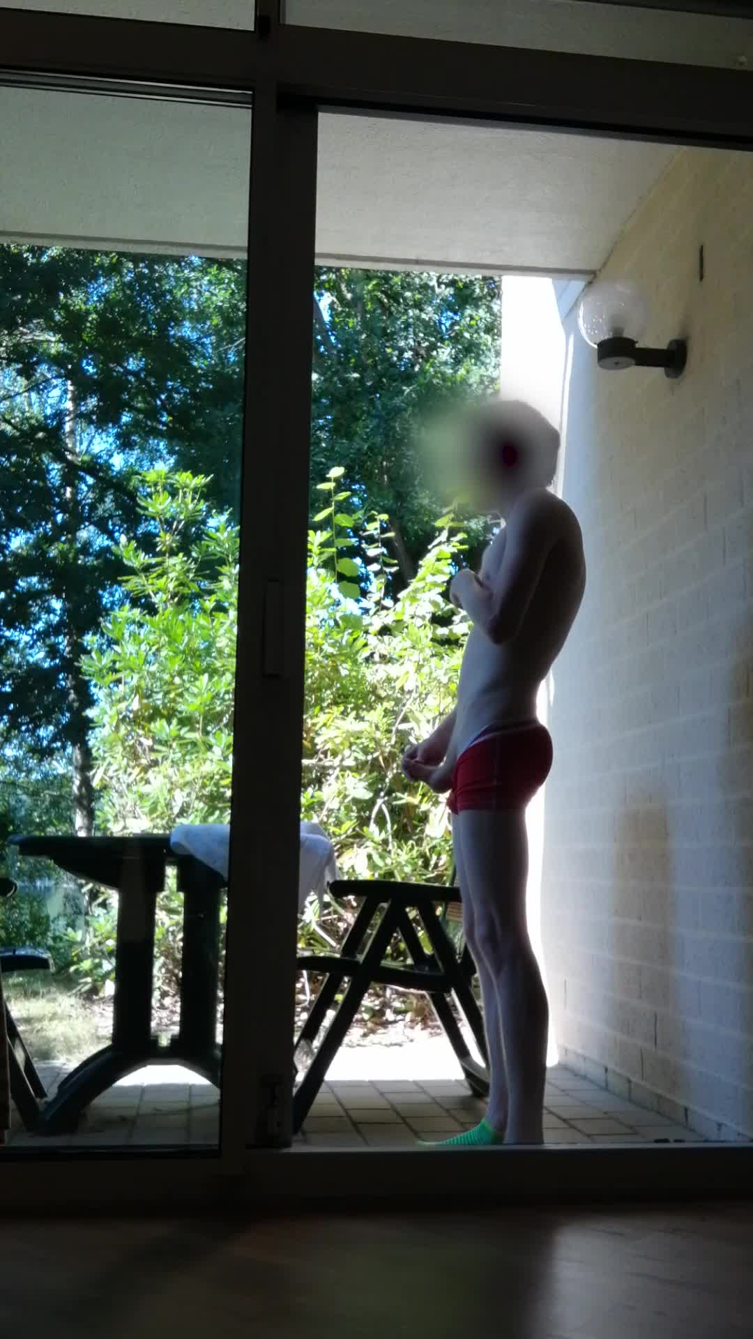 Jerking off in the shared garden of the hotel