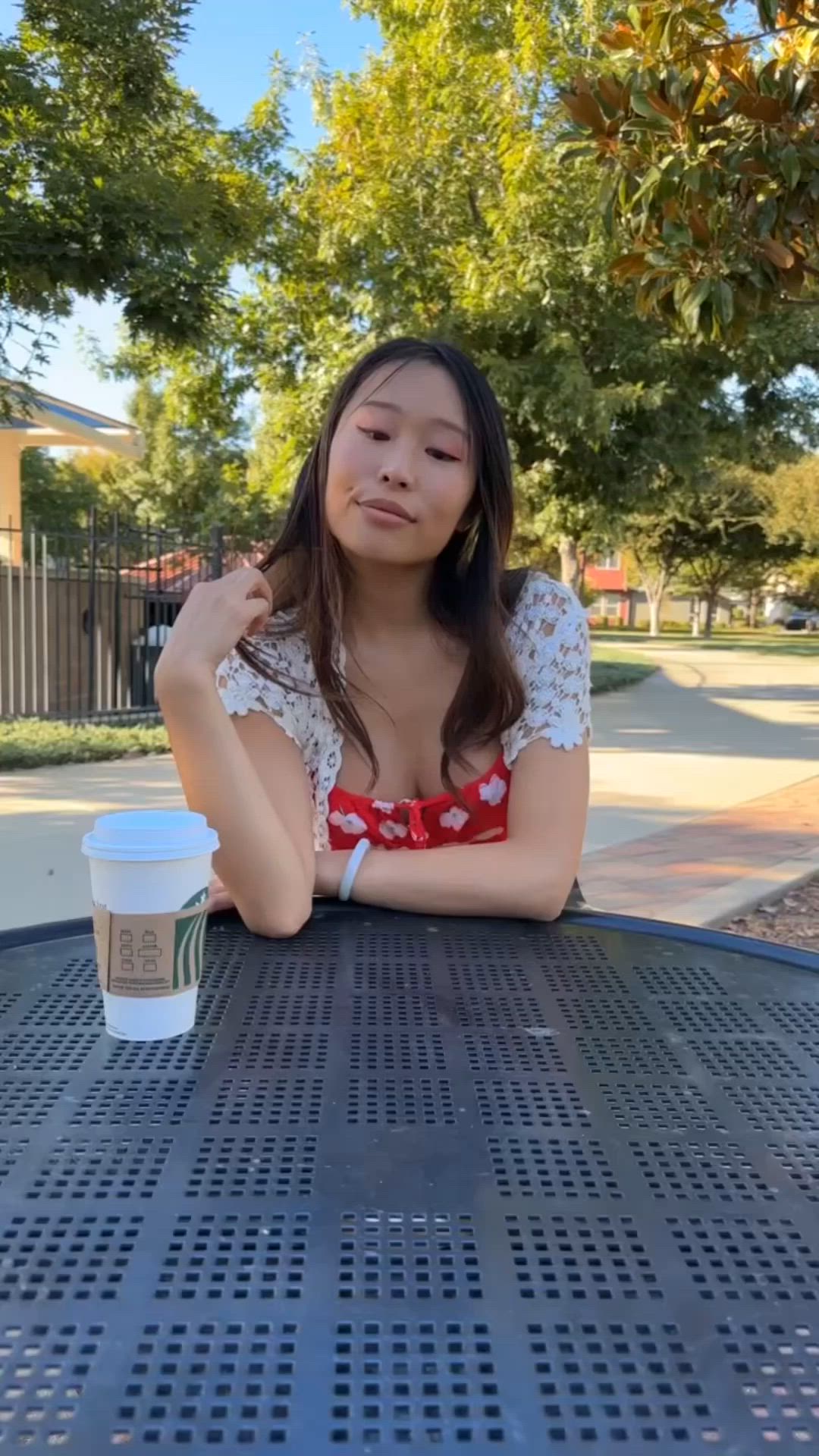 Showing her innocent pussy at the park