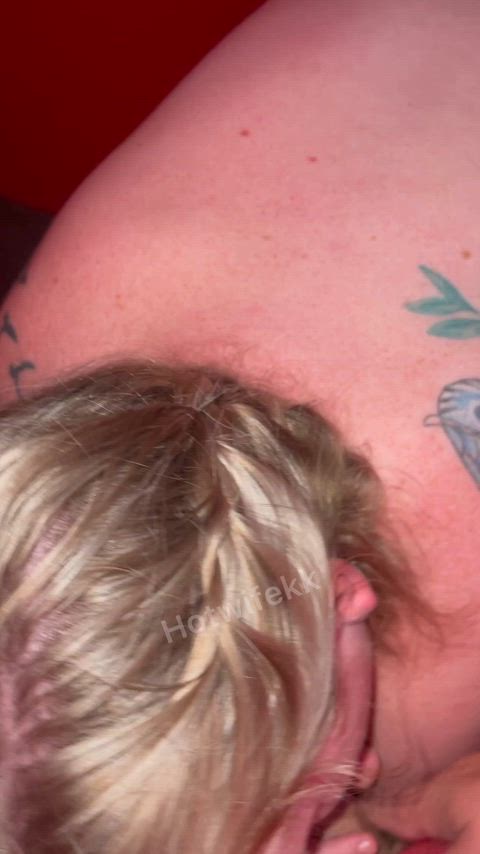 Sucking my boyfriend while getting fucked at the gloryhole