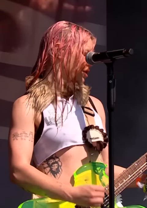 Lead singer of the band Wet Leg performing at Glastonbury this year