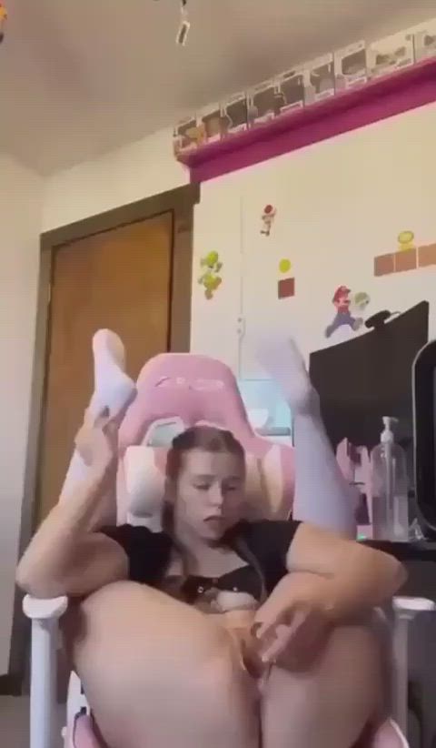 Cute teen playing with her dildo