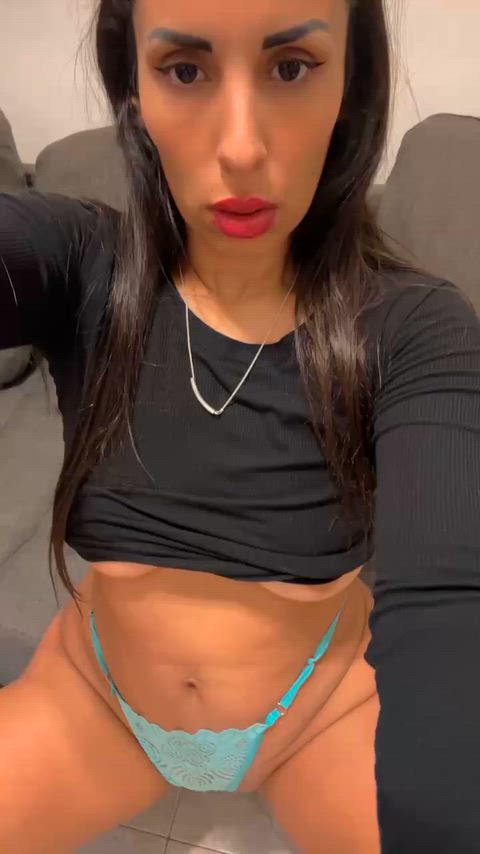 Playing with the strap of my mint thong on the couch, tell me when to pull it off thumbnail