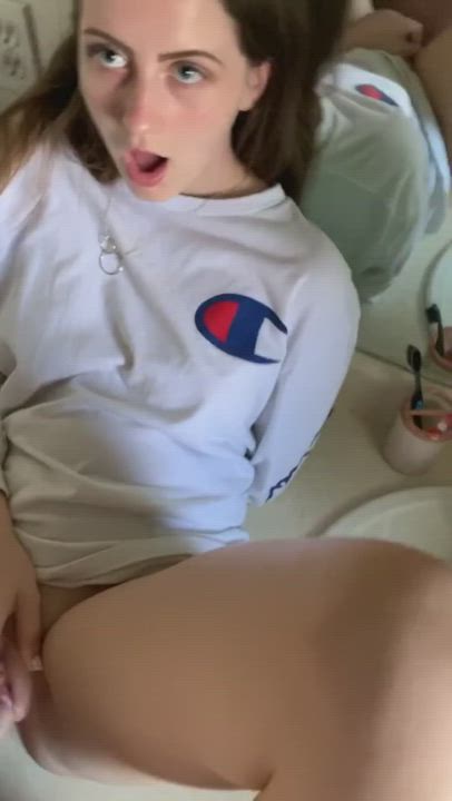 Trying to be quiet in the bathroom