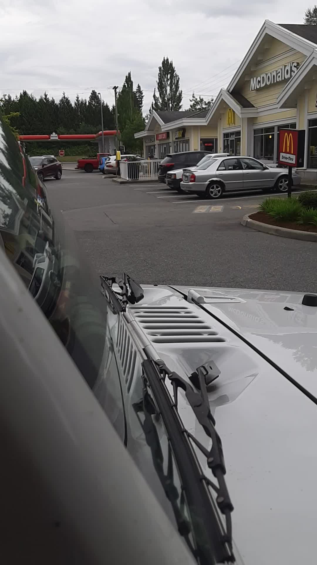 Wetting my jean shorts in a busy parking lot