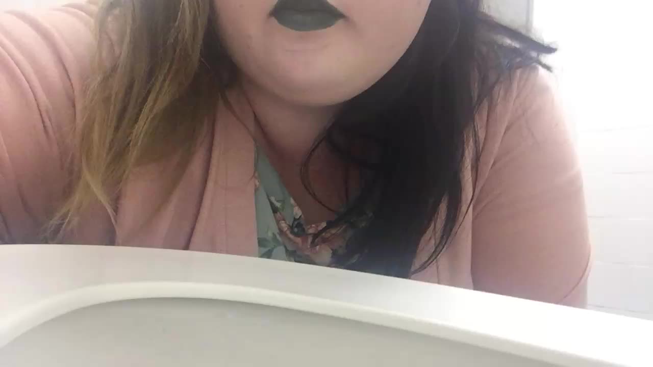 One toilet licking another toilet clean