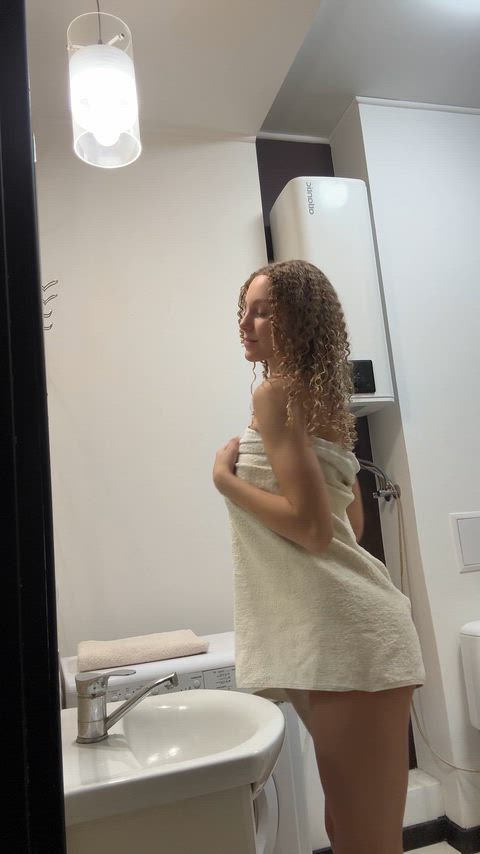 Curly slut after shower