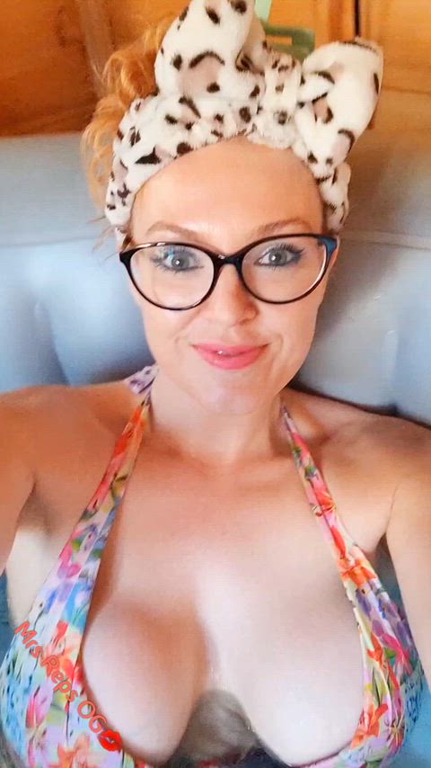 It's snowing outside but its still bikini season in the hot tub