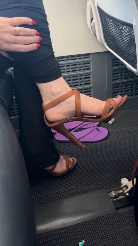 Taking off my flip flops and putting on heels on a flight, modeling them down the aisle for a boobs flash in the bathroom then coming back to my seat!