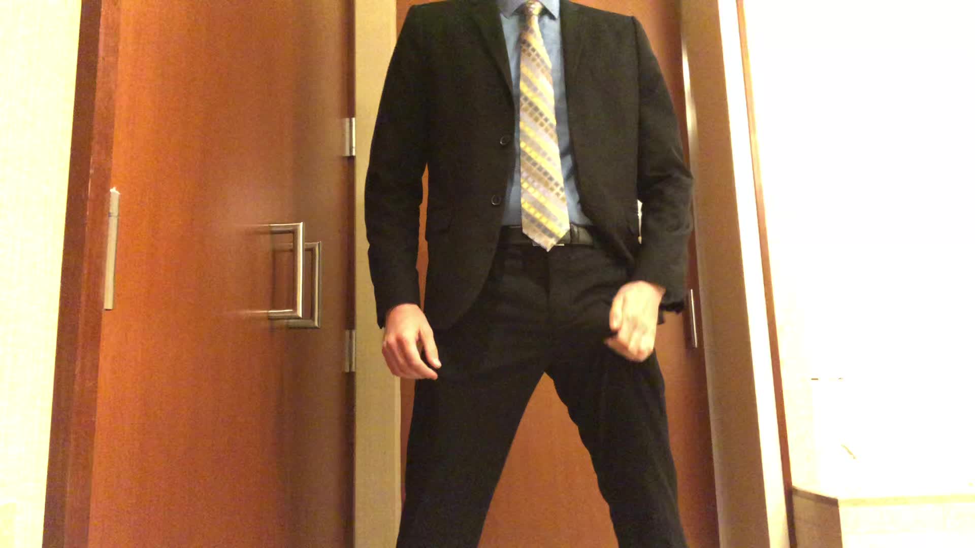 Stripping out of my suit after a long day