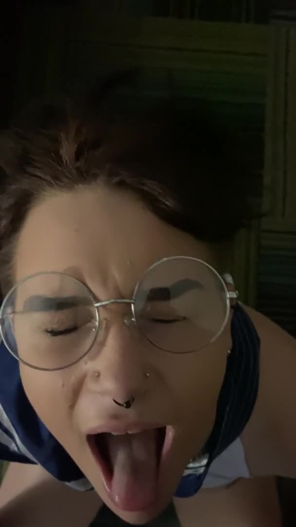 girl with glasses takes a huge load to the face