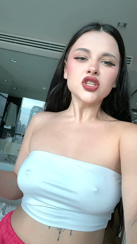 Little shrimp trying to stand tall for Mistress is precious.