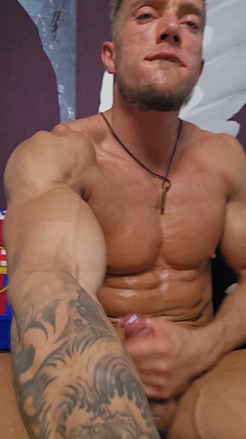 “Oiled up and having a little too much fun with the camera 😏✨