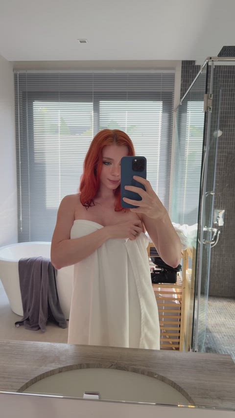 Revealing flawless boobs after a shower