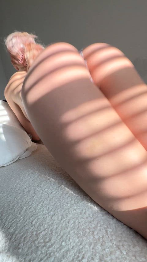Laying in the sun half naked while I read