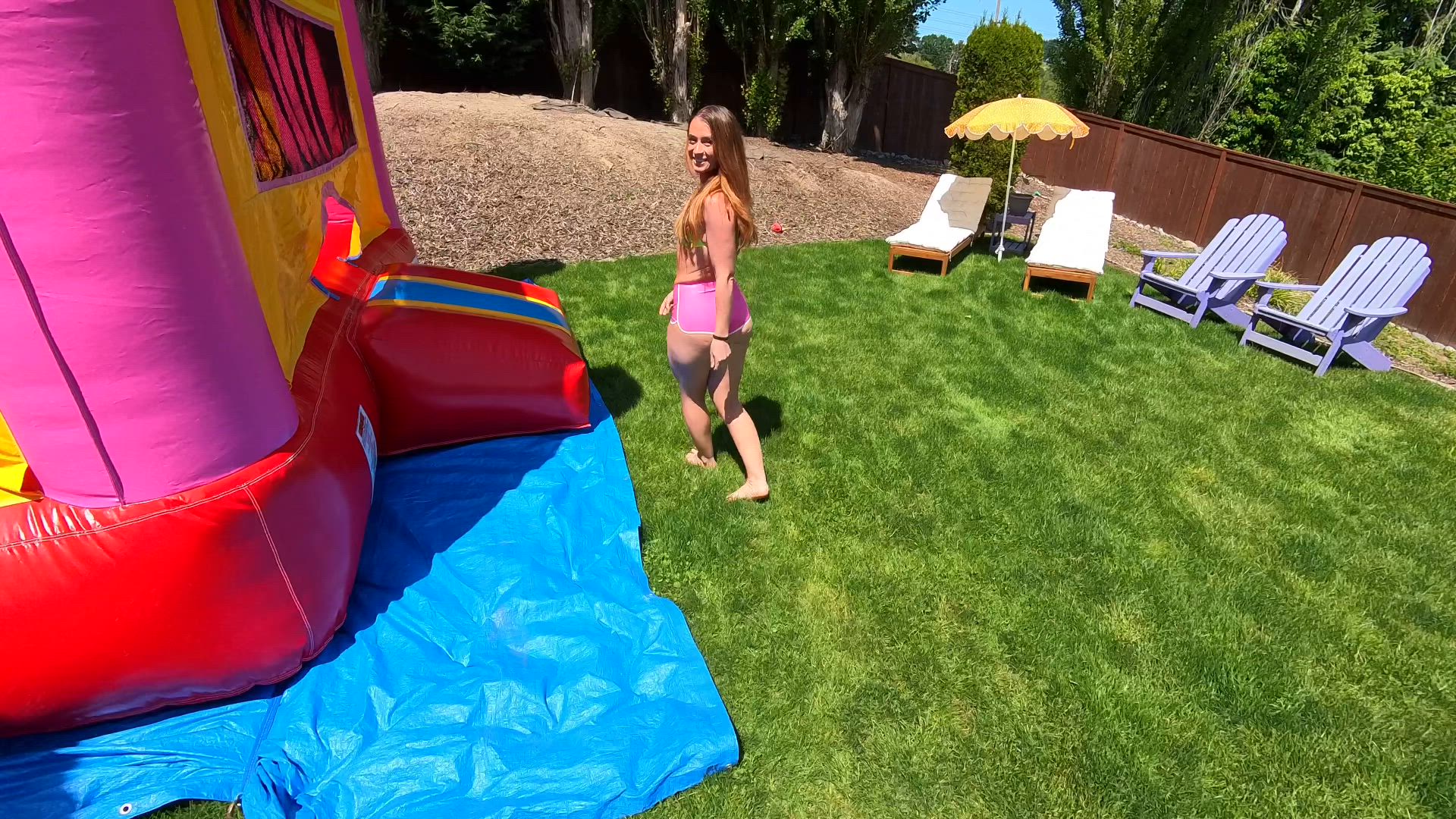 Playing in the bounce house before the party gets started - Sunny & Skye