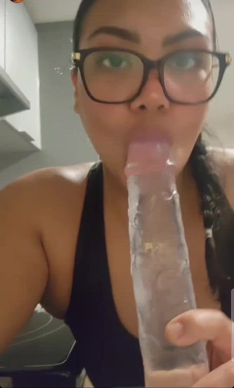 Asian Nerd sucking on her dildo