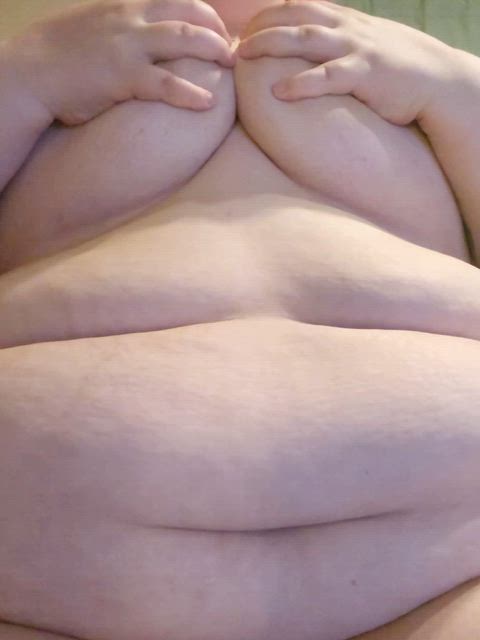 A full belly and tits begging to be grabbed