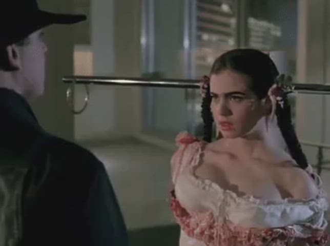 Mia Kirshner in Love and Human Remains (1993)