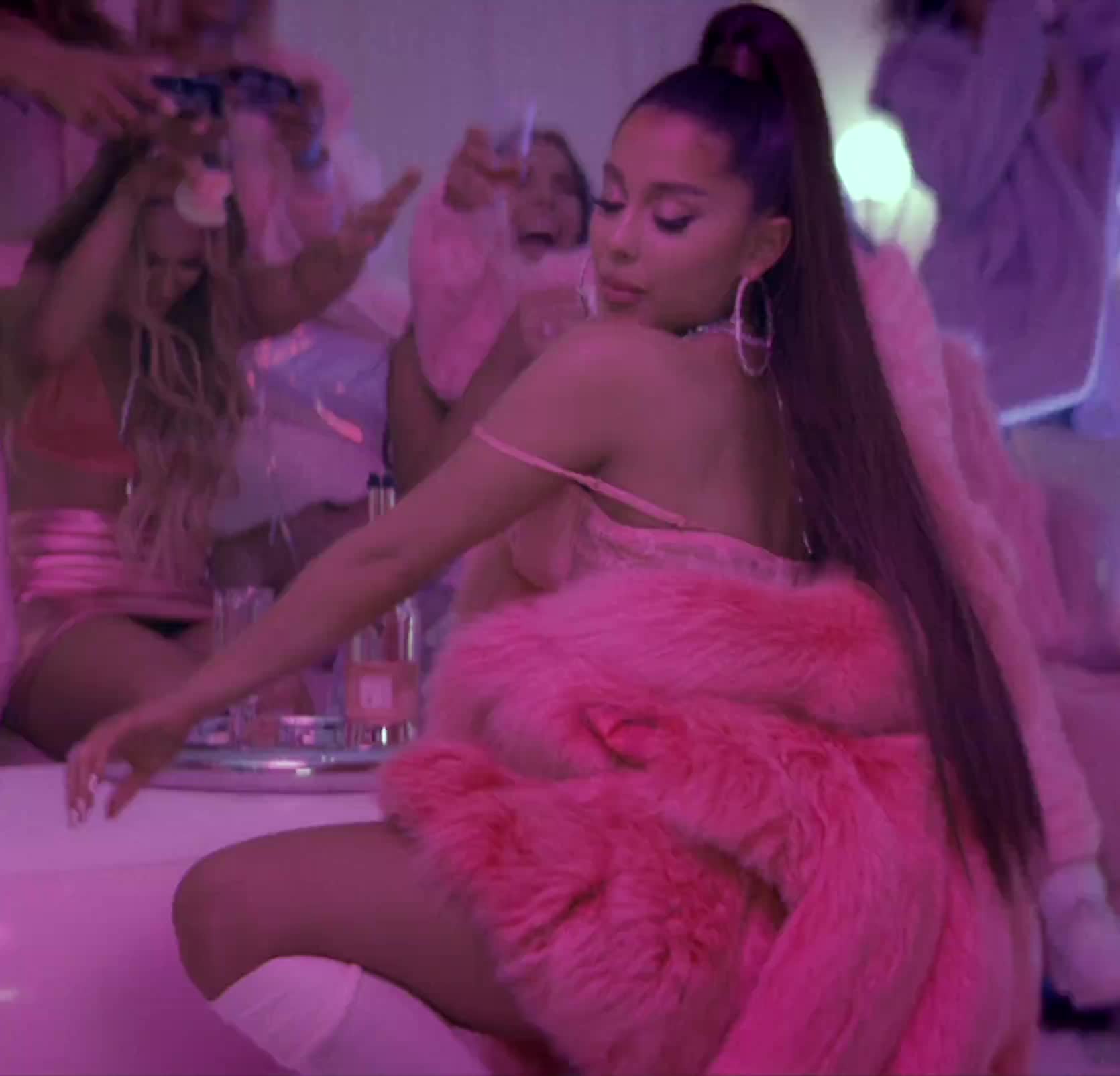Ari twerking with her tongue out