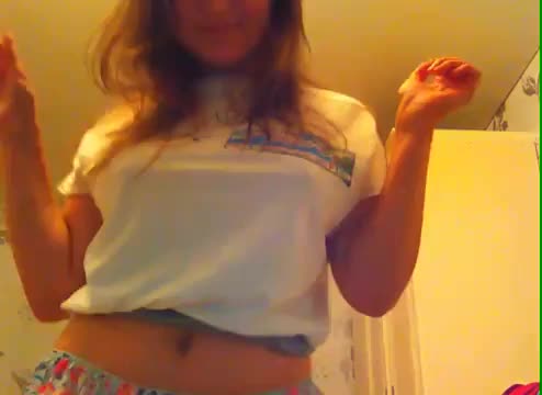 Revealing her cute boobs