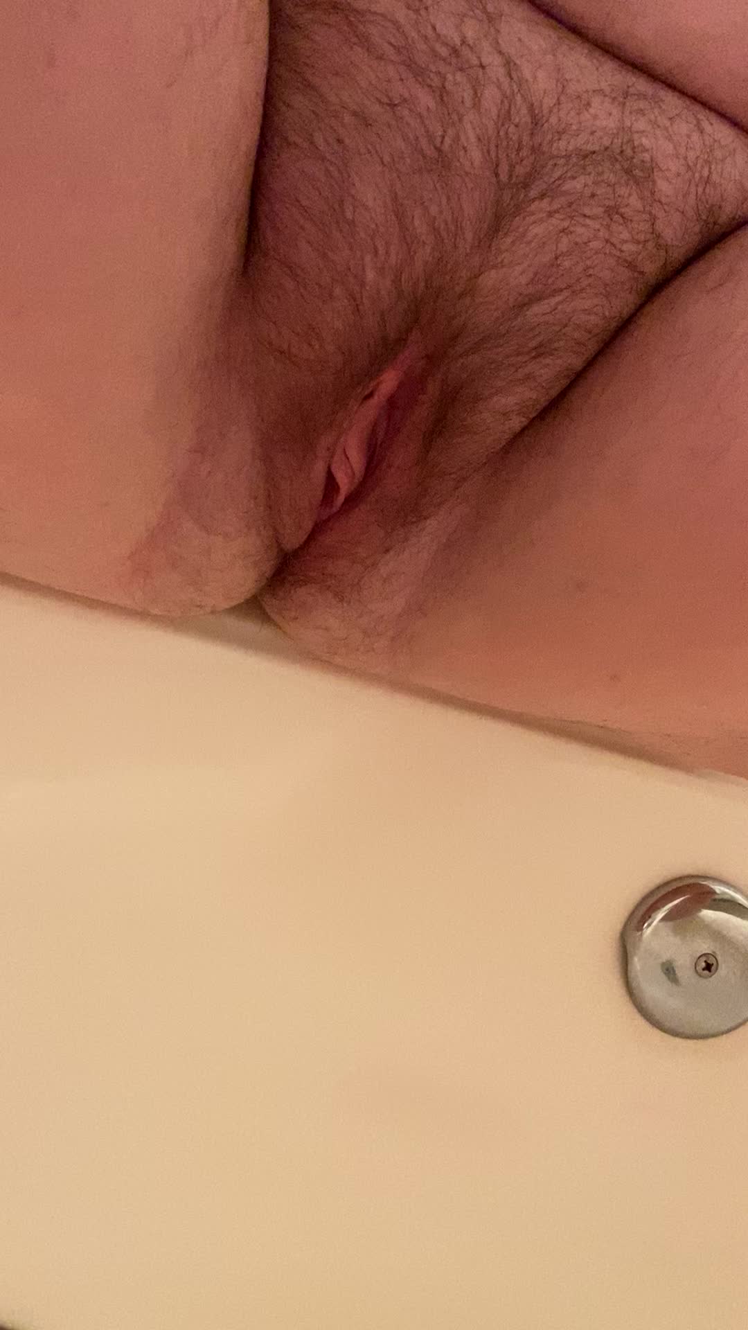 My kitty pees into the tub
