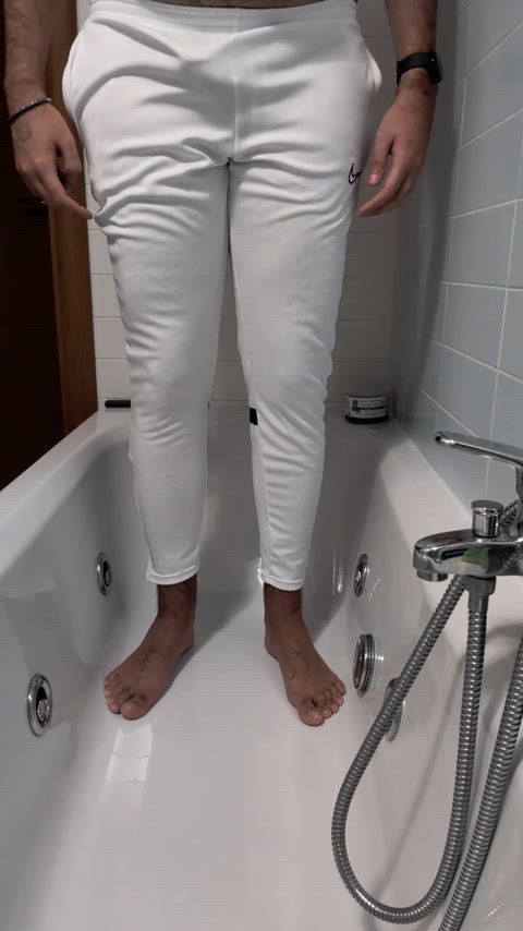 Desperate big piss in my white Nike trackpants