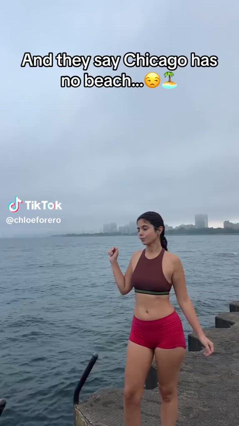 Chloe looking sexy in a bathing suit at concrete beach