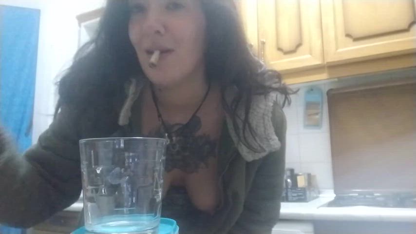 Public Access TV in AltBoobWorld : This lady is showing you how to make a delicious cocktail drink.