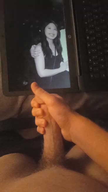 Cute Asian girl covered in cum