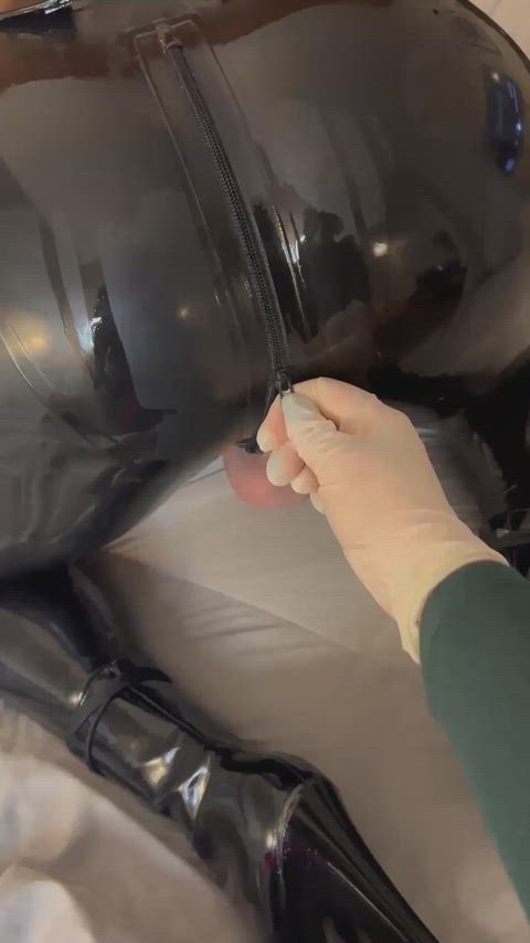 Having fun with my caged latex sissy