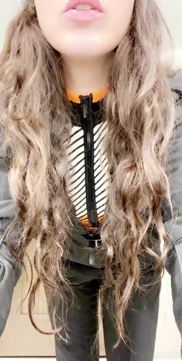 fancy outfit and a wink